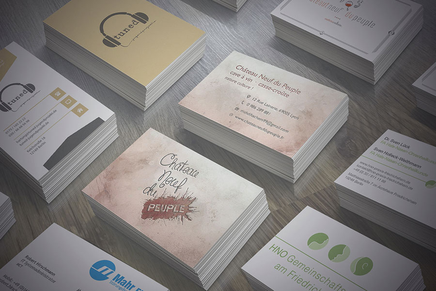 <span>Business Cards</span><i>→</i>